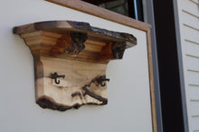 Load image into Gallery viewer, wall shelf  brown maple with three antique cast iron maple syrup taps live edge crown molding burl shelf supports