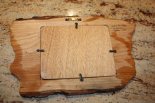 Load image into Gallery viewer, back of scroll saw loon on mountain lake showing sawtooth hanger and plywood backing