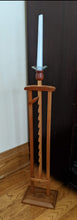 Load image into Gallery viewer, shaker ratcheting candle holder adjustable candle height cherry shown standing on floor
