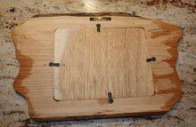 Load image into Gallery viewer, back of loon wall hanging showing sawtooth hanger and plywood backer
