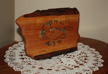 Load image into Gallery viewer, scroll saw loon on mountain lake live edge cherry birch bark backing displayed on table
